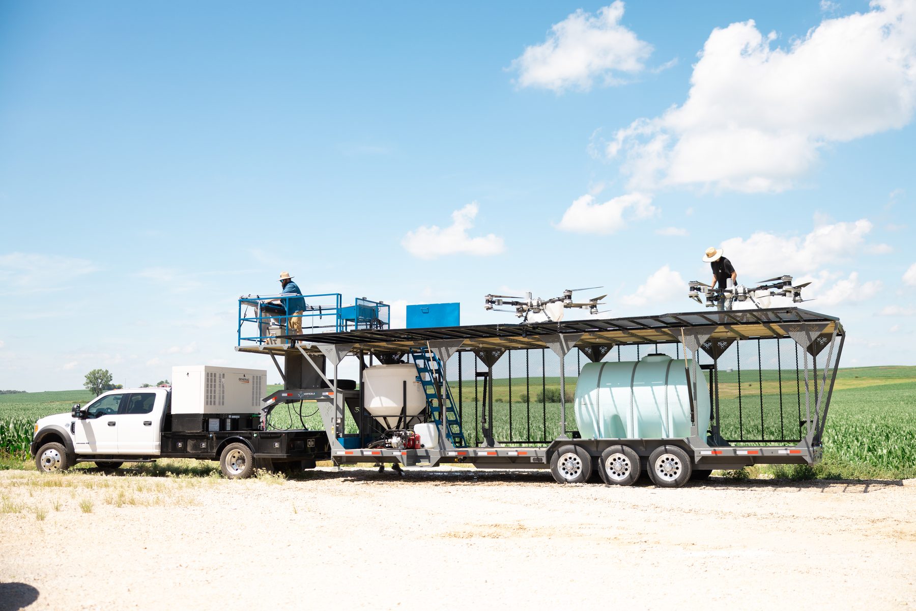 Vertical Ag spray drone trailer — full-length flight deck with drones on board